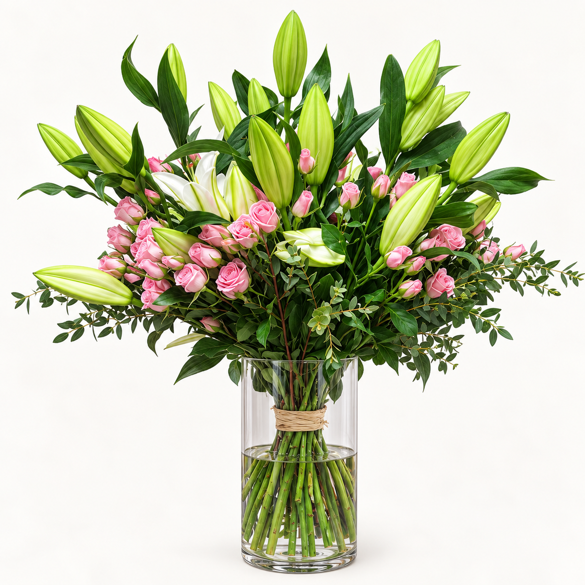 10 white lilies and 10 pink baby roses arranged in a glass vase