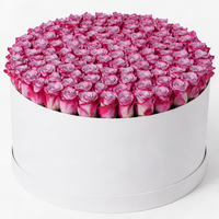 150 premium purple roses arranged in a luxury white flower box with same-day flower delivery in Kuwait.