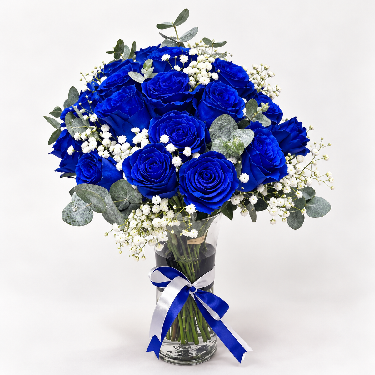25 blue roses arranged in a vase with white baby's breath and eucalyptus greenery also delivered all areas in kuwait