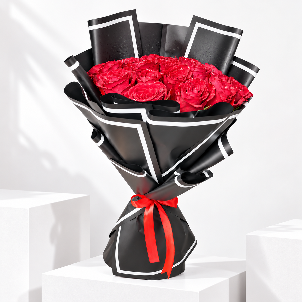 25 red roses hand-tied bouquet for anniversaries and birthdays by Flowers in Kuwait