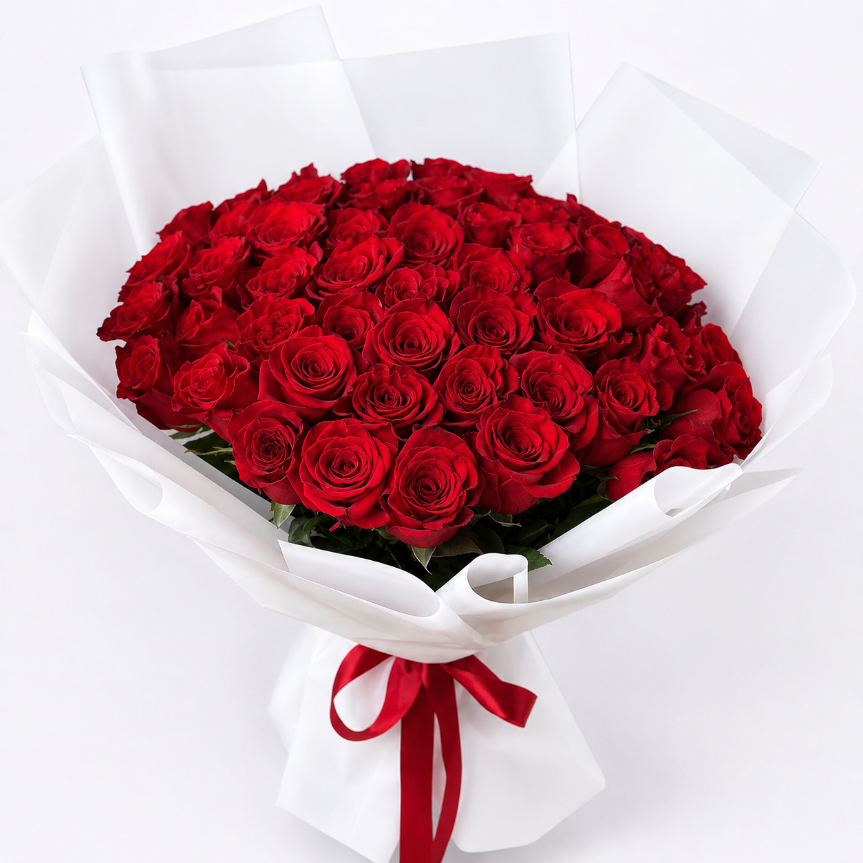 50 red roses bouquet with elegant white wrapping and red ribbon