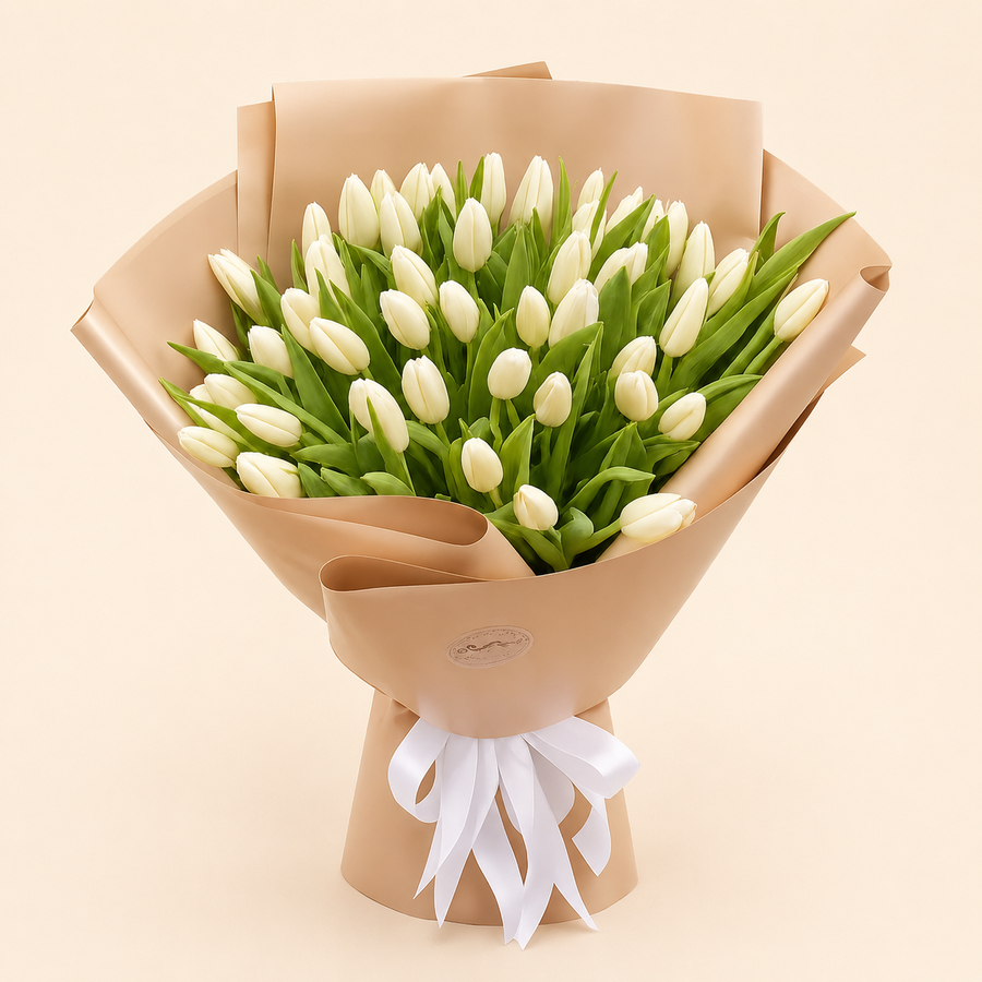 50 White Tulips Bouquet with brown wrapping for same-day flower delivery in Kuwait.