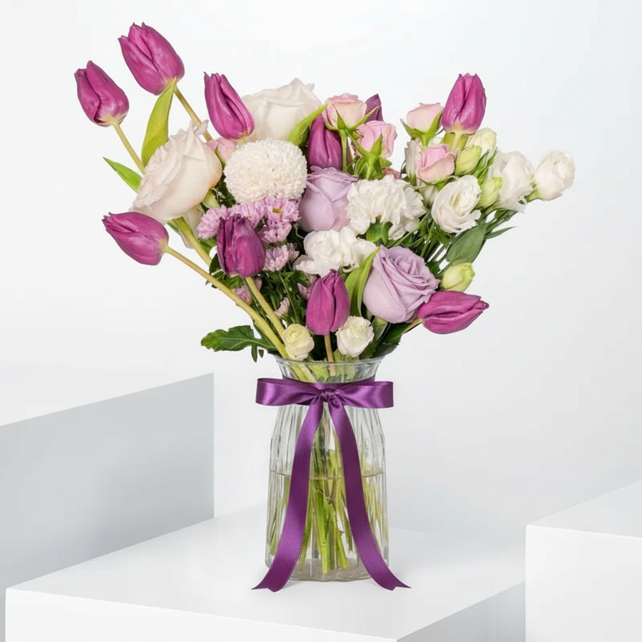 Elegant Lilac & Ivory Tulip Arrangement in Clear Glass Vase