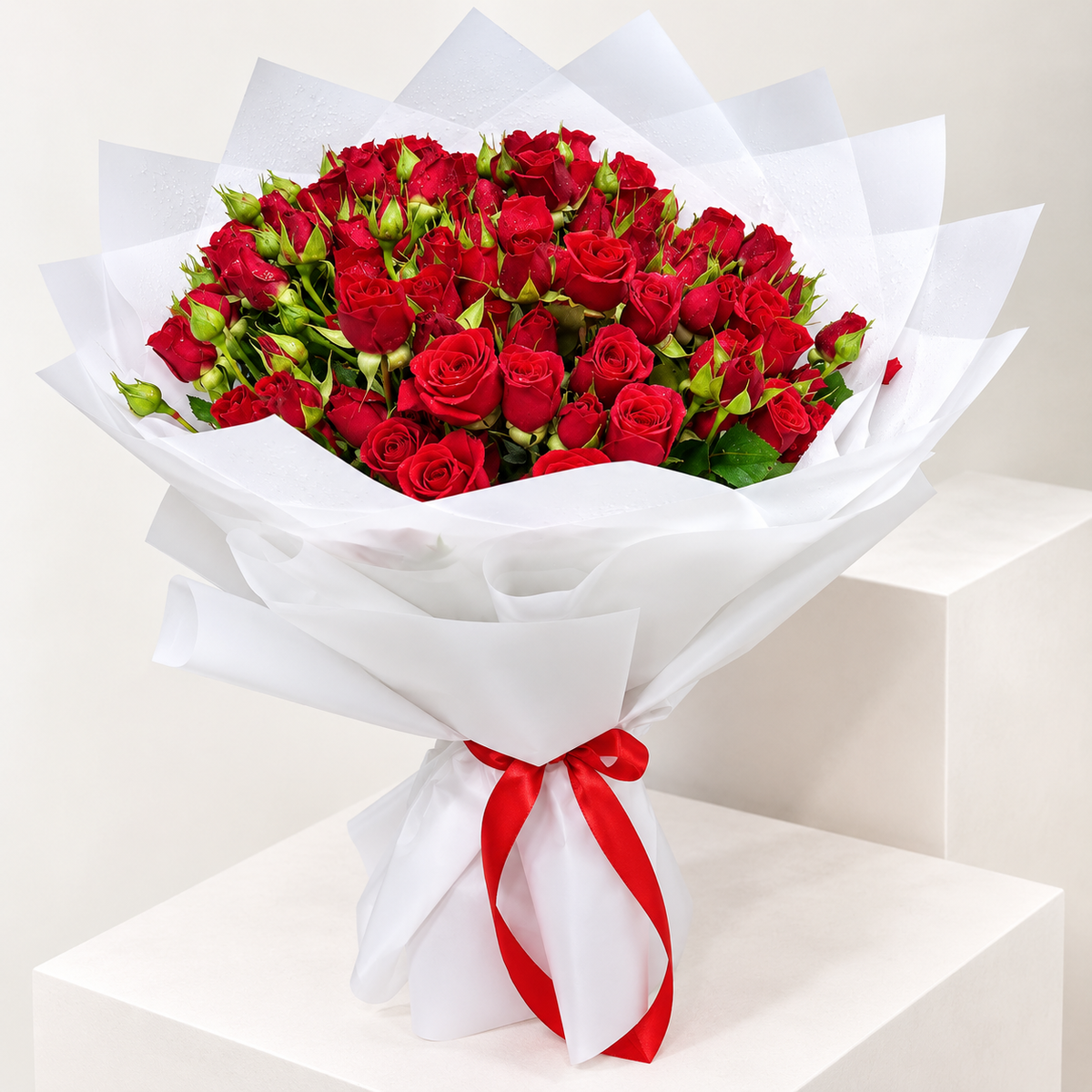 20 red baby roses bouquet with elegant white wrapping
