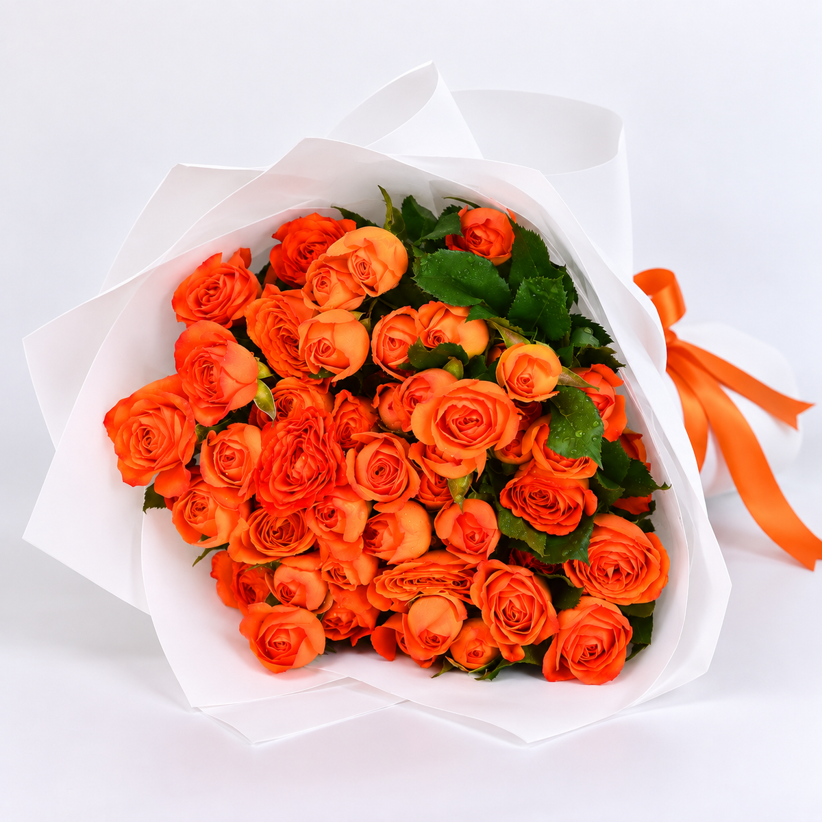 Orange baby roses bouquet with 10 stems for same-day flower delivery in Kuwait