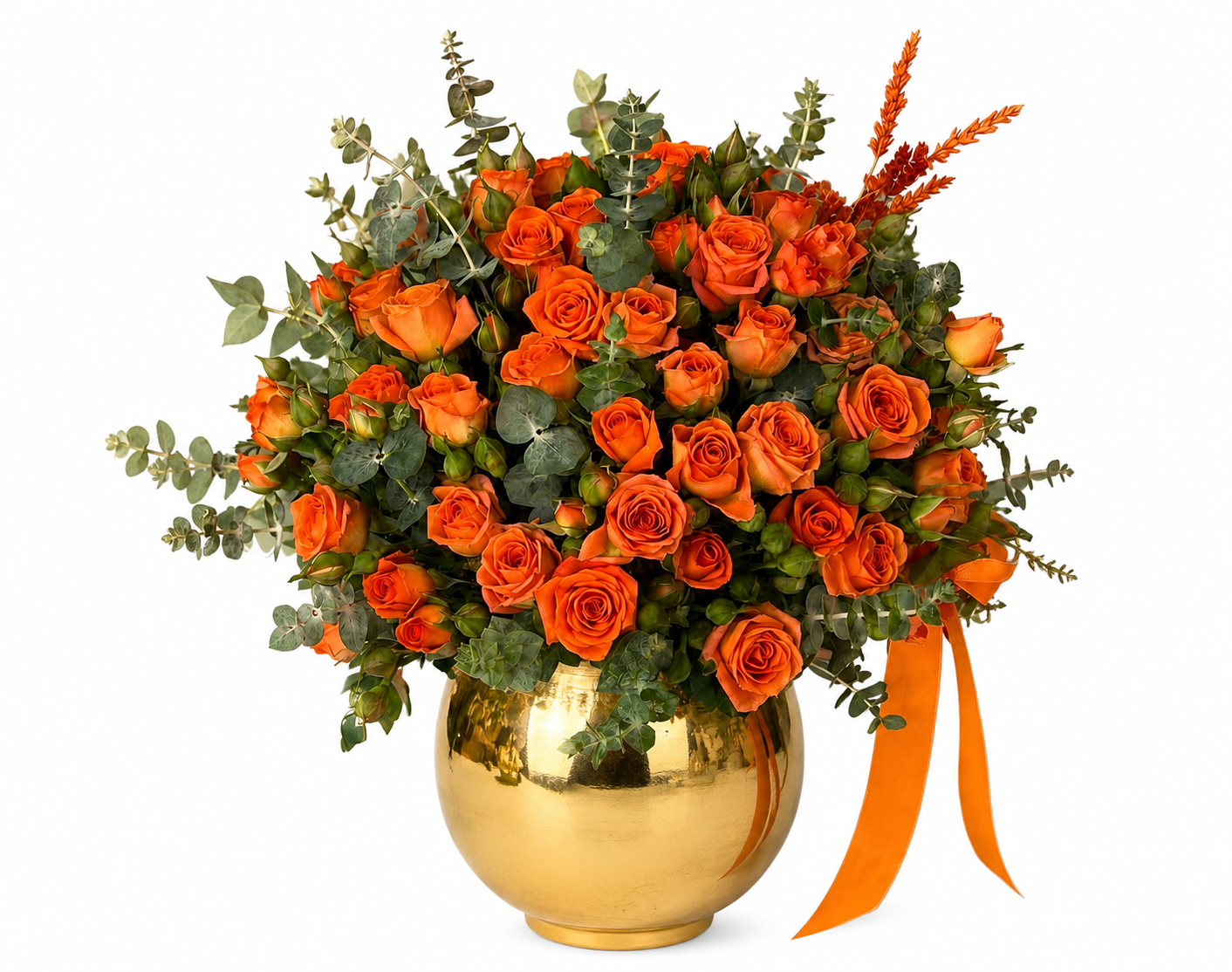 Fresh orange baby roses and orange roses arranged with eucalyptus in a shiny gold fish bowl vase for same-day flower delivery in Kuwait.