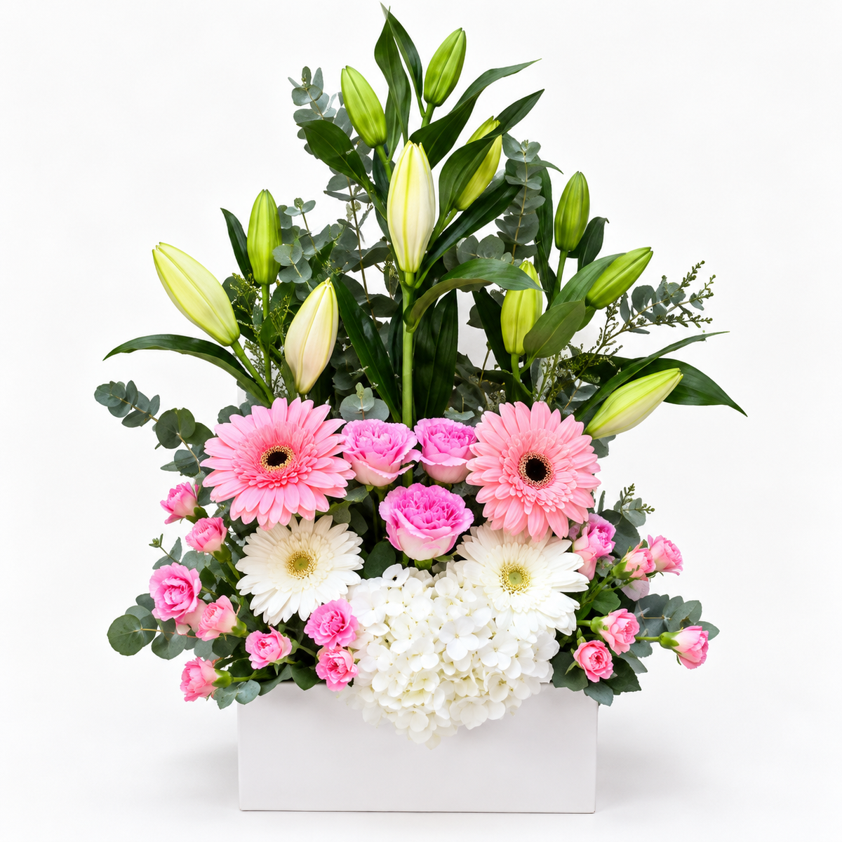 Pink and white luxury mixed flower box with white lilies, pink and white gerberas, pink roses, baby roses and white hydrangeas in a white acrylic box.