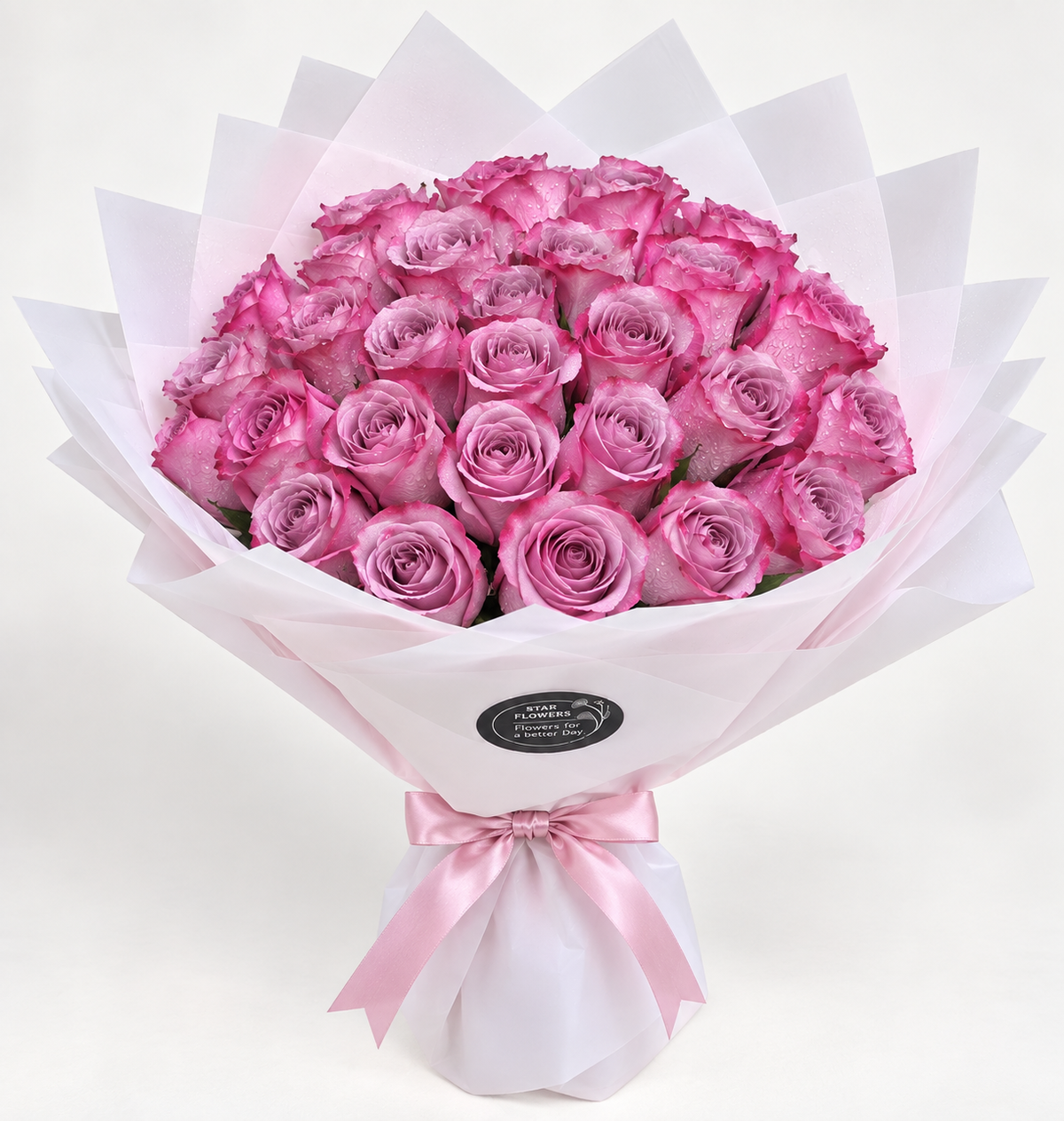 Purple roses bouquet with 25 fresh roses, white wrapping and purple satin ribbon in Kuwait
