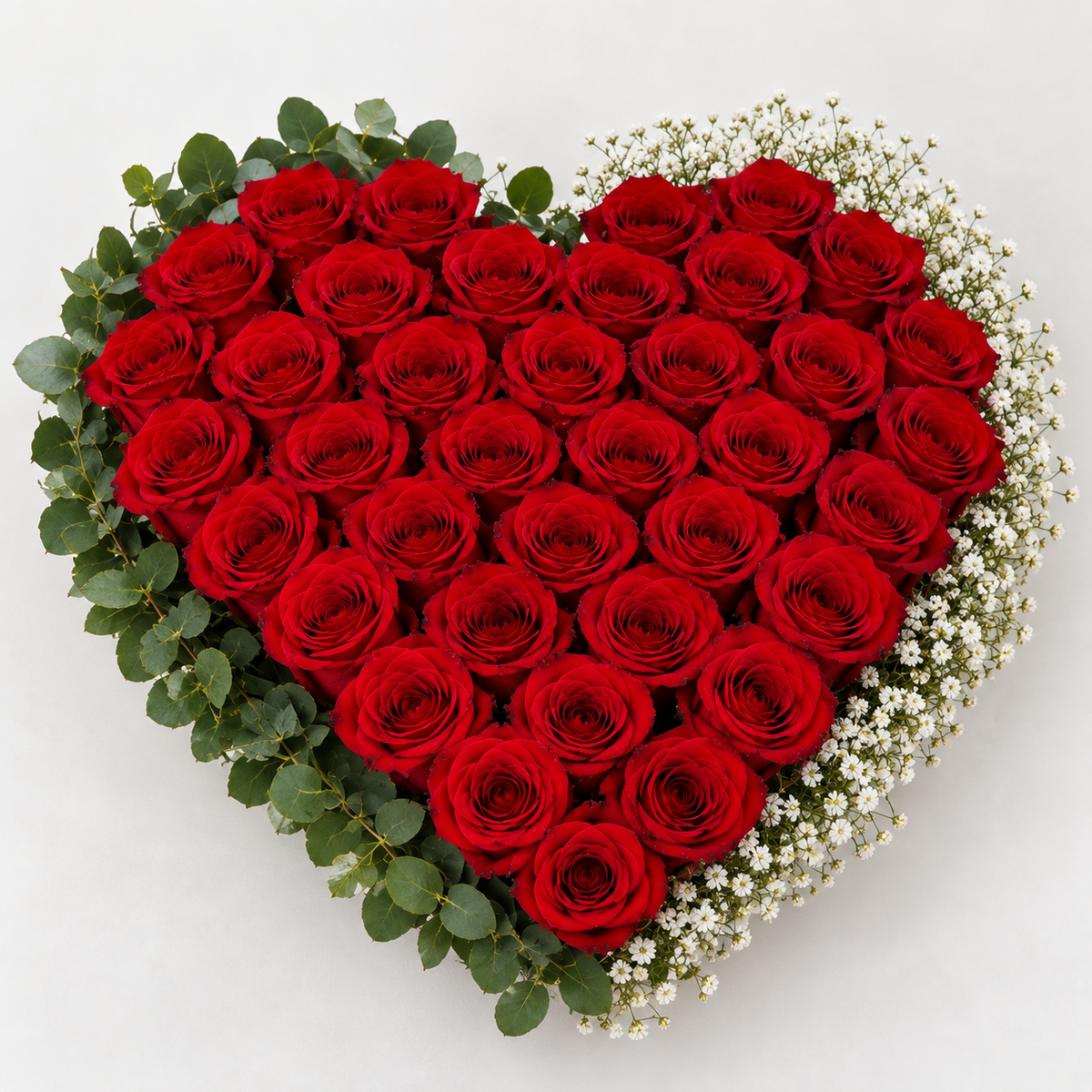 Valentine's heart-shaped arrangement with approximately 60 fresh red roses