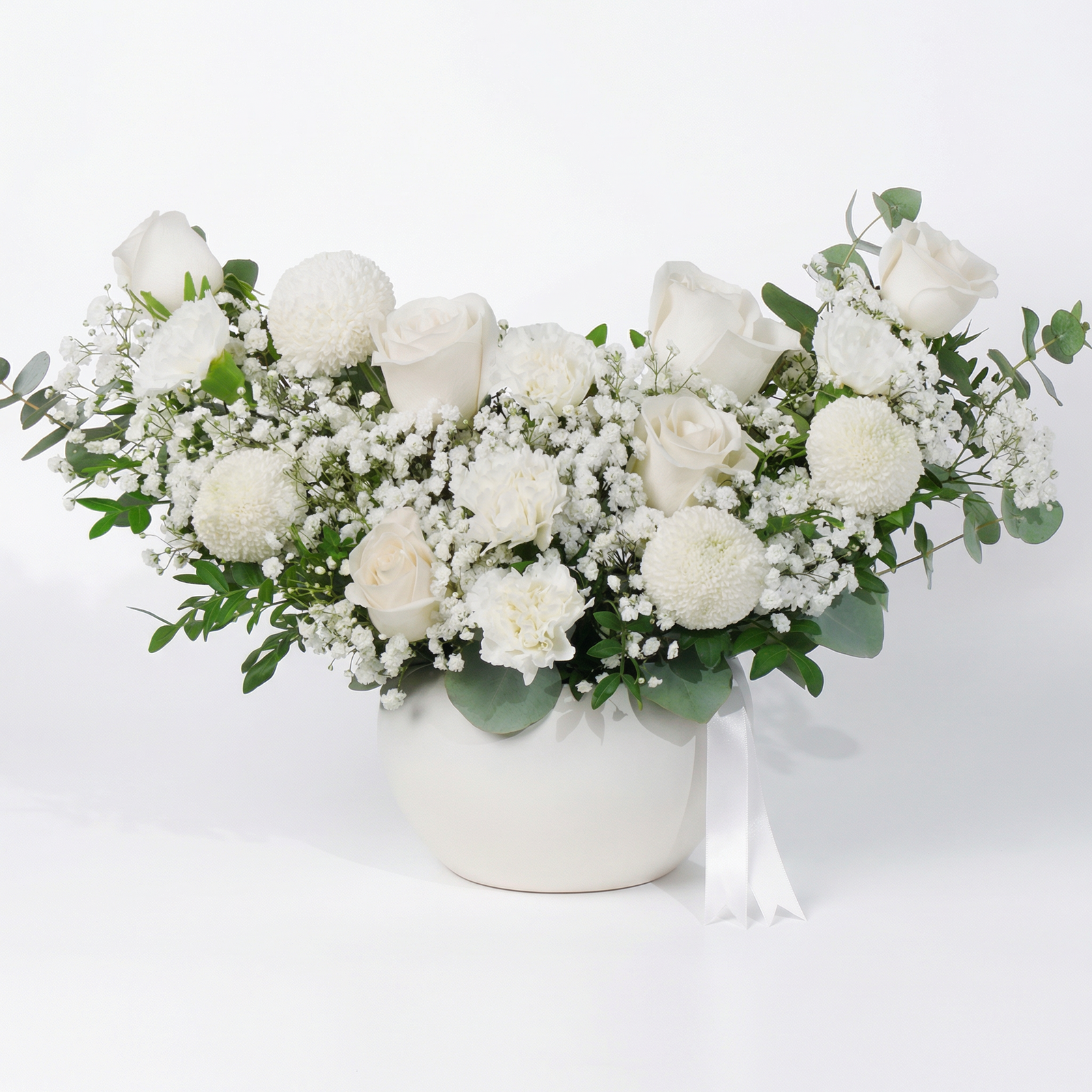 Elegant Ivory Floral Arrangement in Decorative Vase