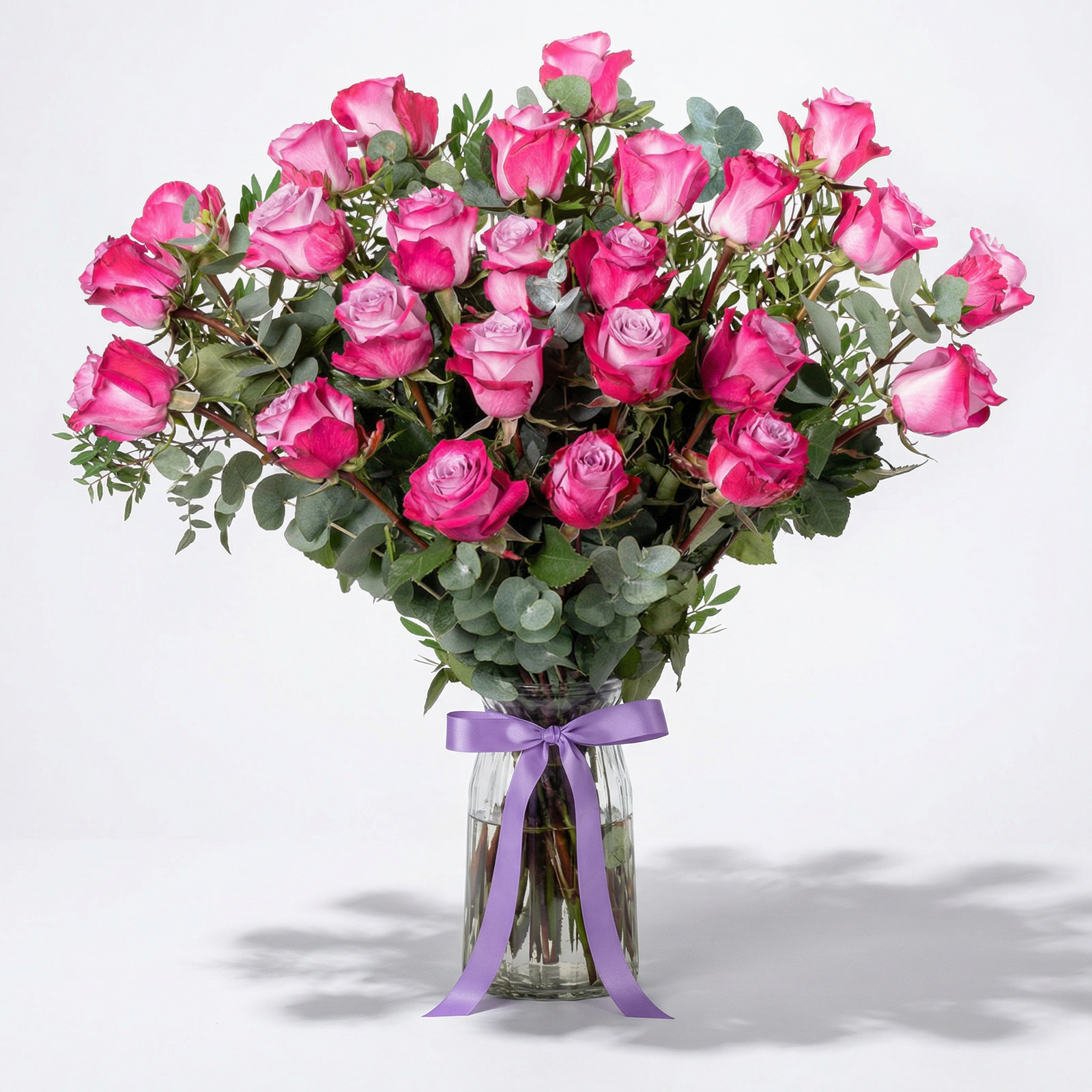 Elegant 25 Lavender Rose Arrangement in Glass Vase