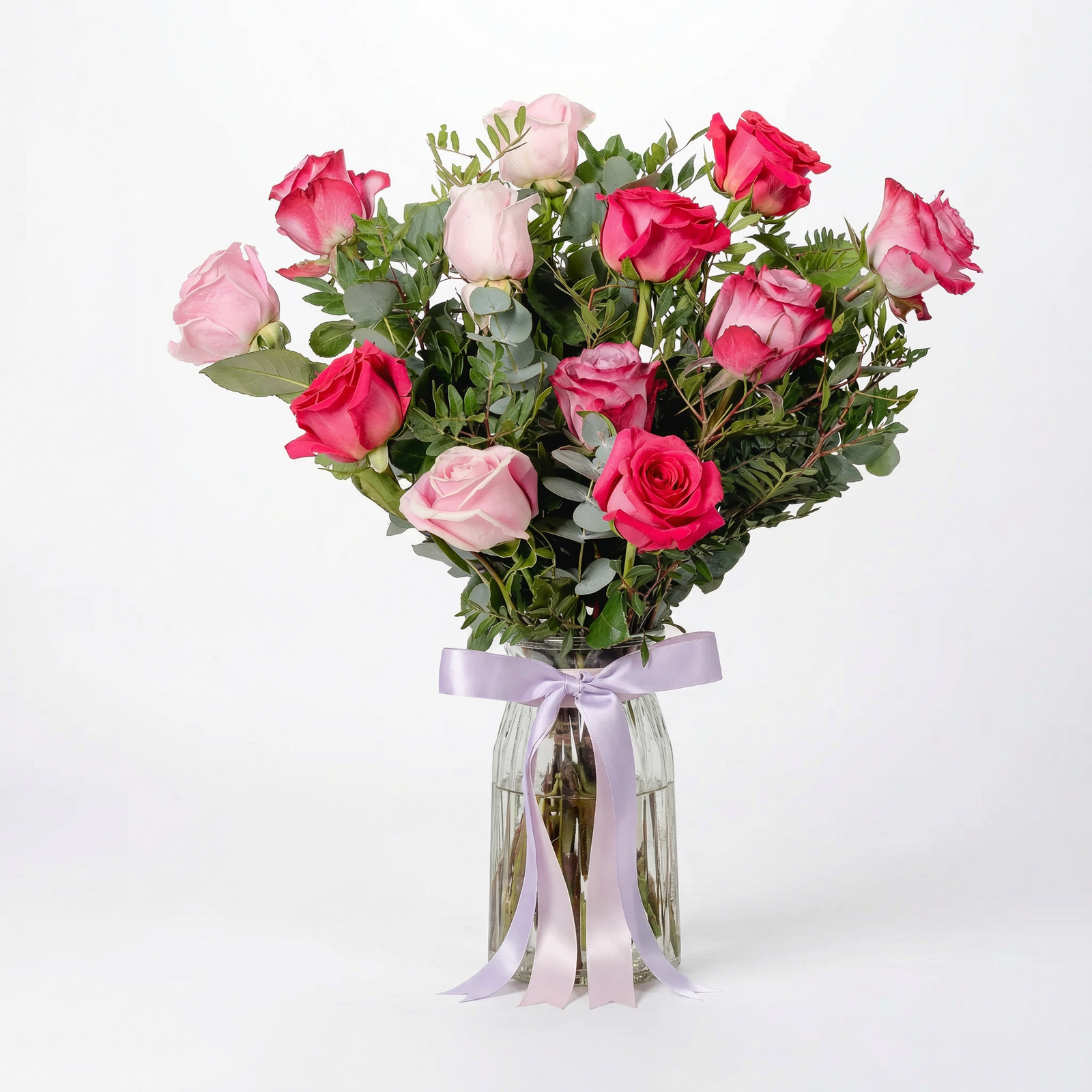 Elegant Dozen Blush Rose Arrangement in Glass Vase
