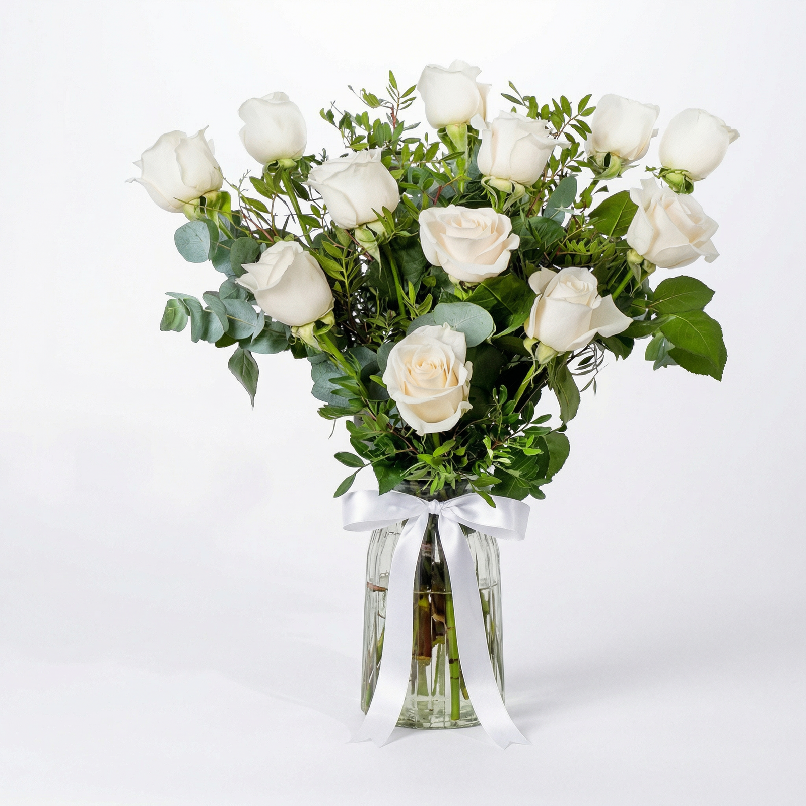 Elegant Dozen White Rose Arrangement in Glass Vase