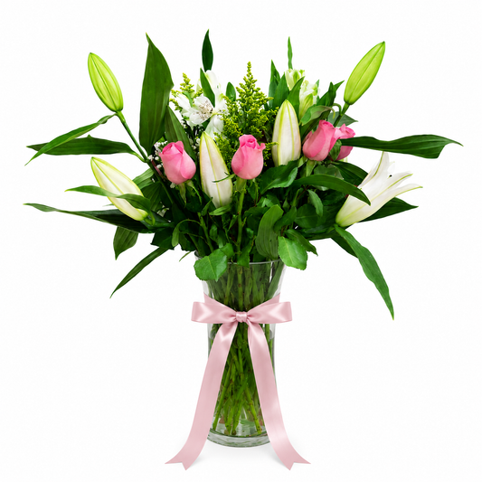 White Lilies & Pink Roses Vase Arrangement. Order from anywhere in the world with same-day flower delivery across all areas in Kuwait, freshness guaranteed.