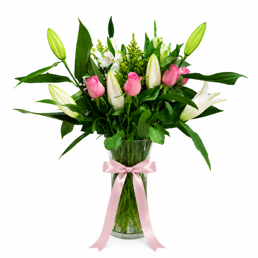 White Lilies & Pink Roses Vase Arrangement. Order from anywhere in the world with same-day flower delivery across all areas in Kuwait, freshness guaranteed.
