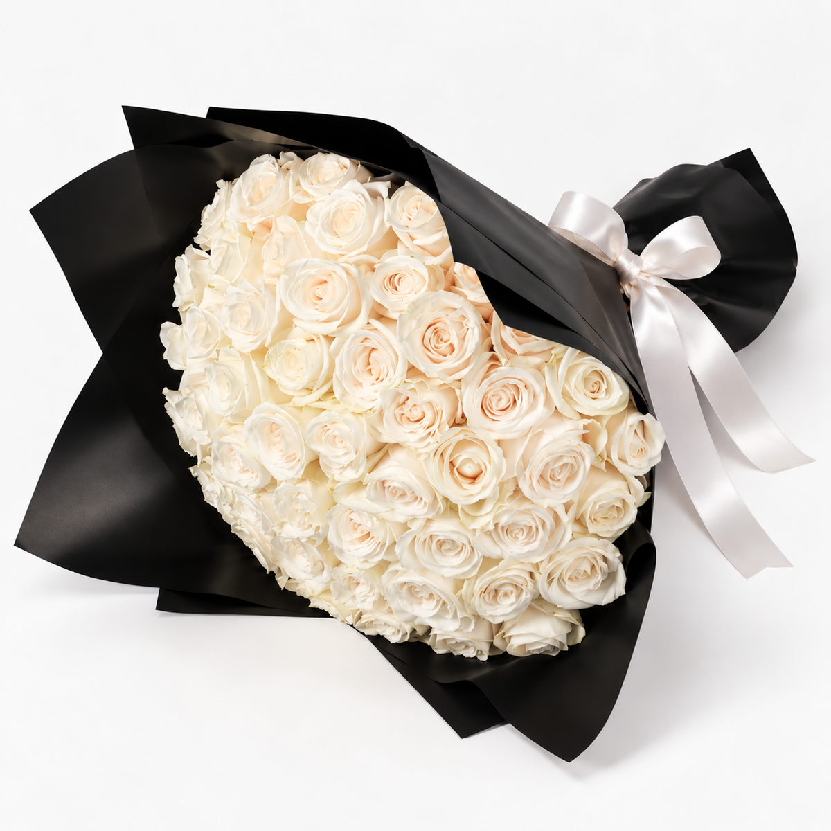 Elegant white roses bouquet arranged in black wrapping, available with black or white wrapping in 30, 40, 50 or 60 roses.